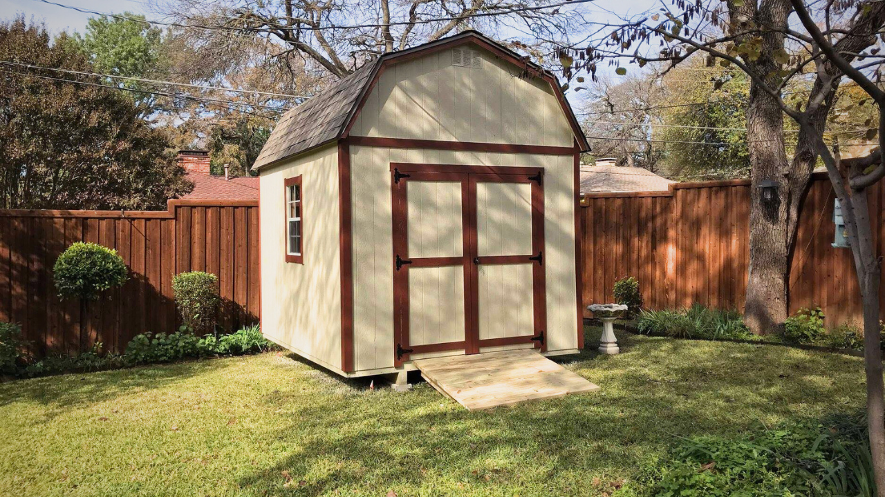 shed inside a fenced backyard